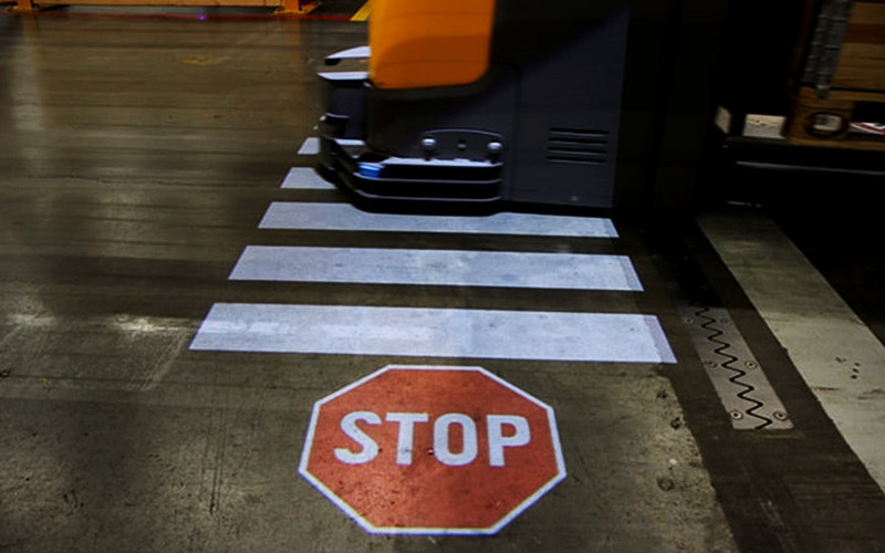 projected stop safety warning sign